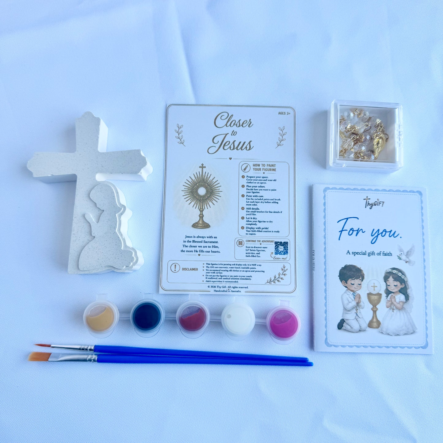 First Holy Communion plaster figurine gift set with kneeling figure, cross, paints and faith activity cards by Thy Gift