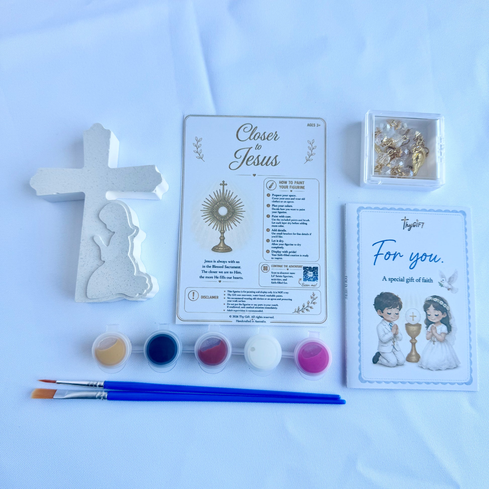 First Holy Communion plaster figurine gift set with kneeling figure, cross, paints and faith activity cards by Thy Gift